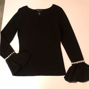 Black INC sweater w flouncy cuffs & pearls